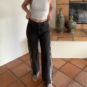 Levi’s custom vintage black straight leg jeans with animal print panels size 30